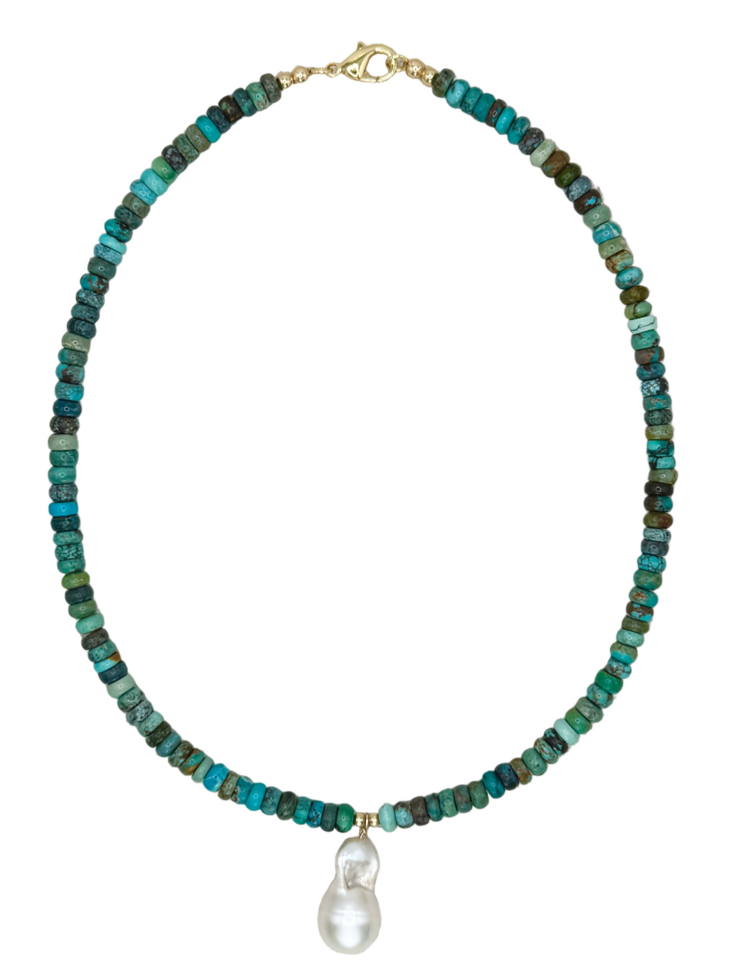 Necklace with blue and green beads and a pearl pendant on a beige fabric background