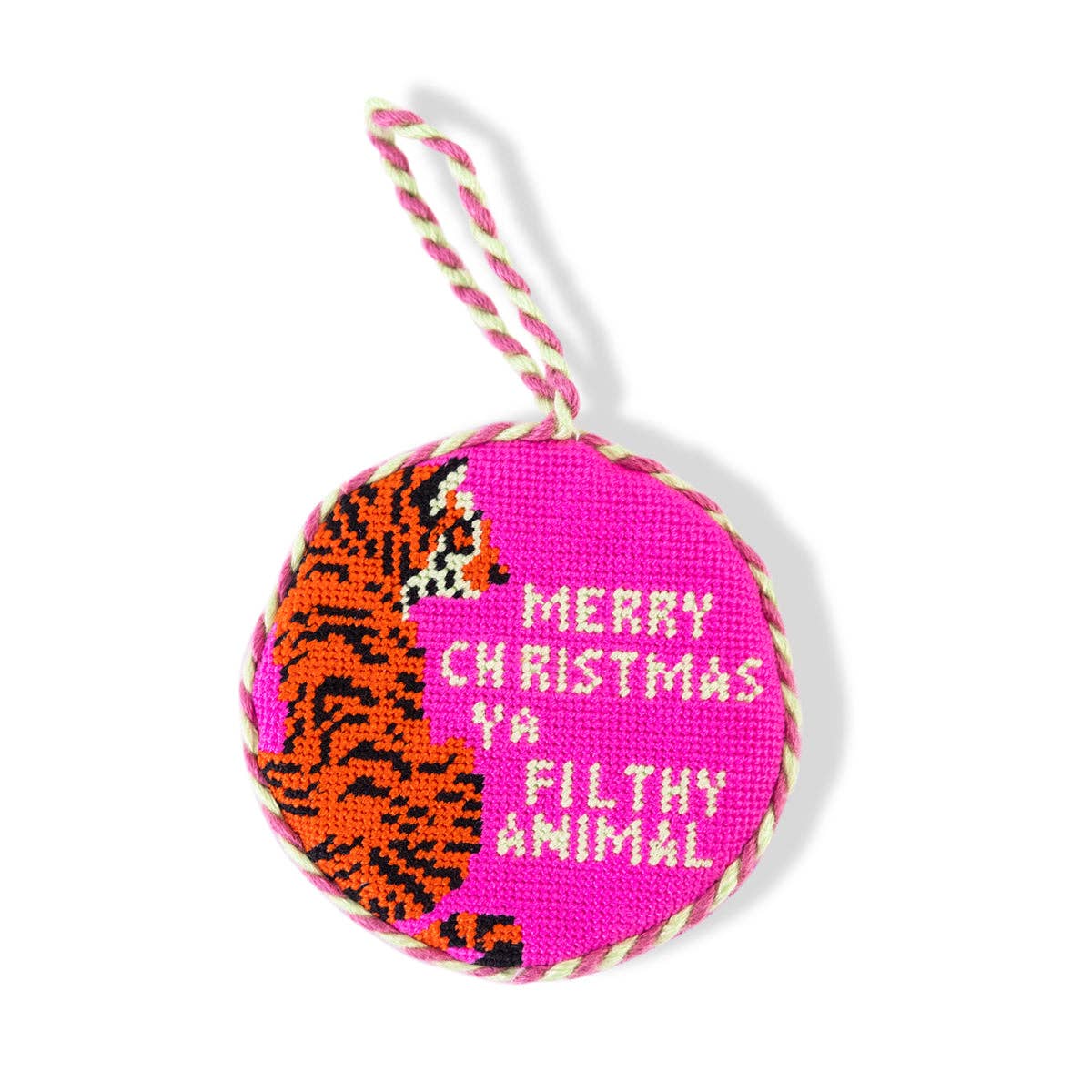 Decorative ornament with tiger design and text on a pink background
