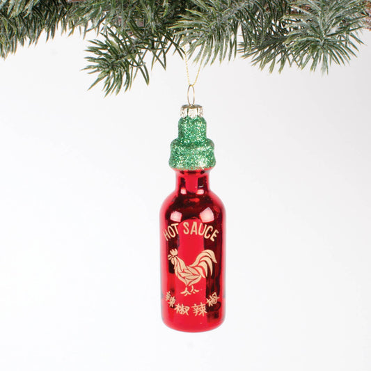 Red hot sauce bottle ornament with a rooster design on a white background