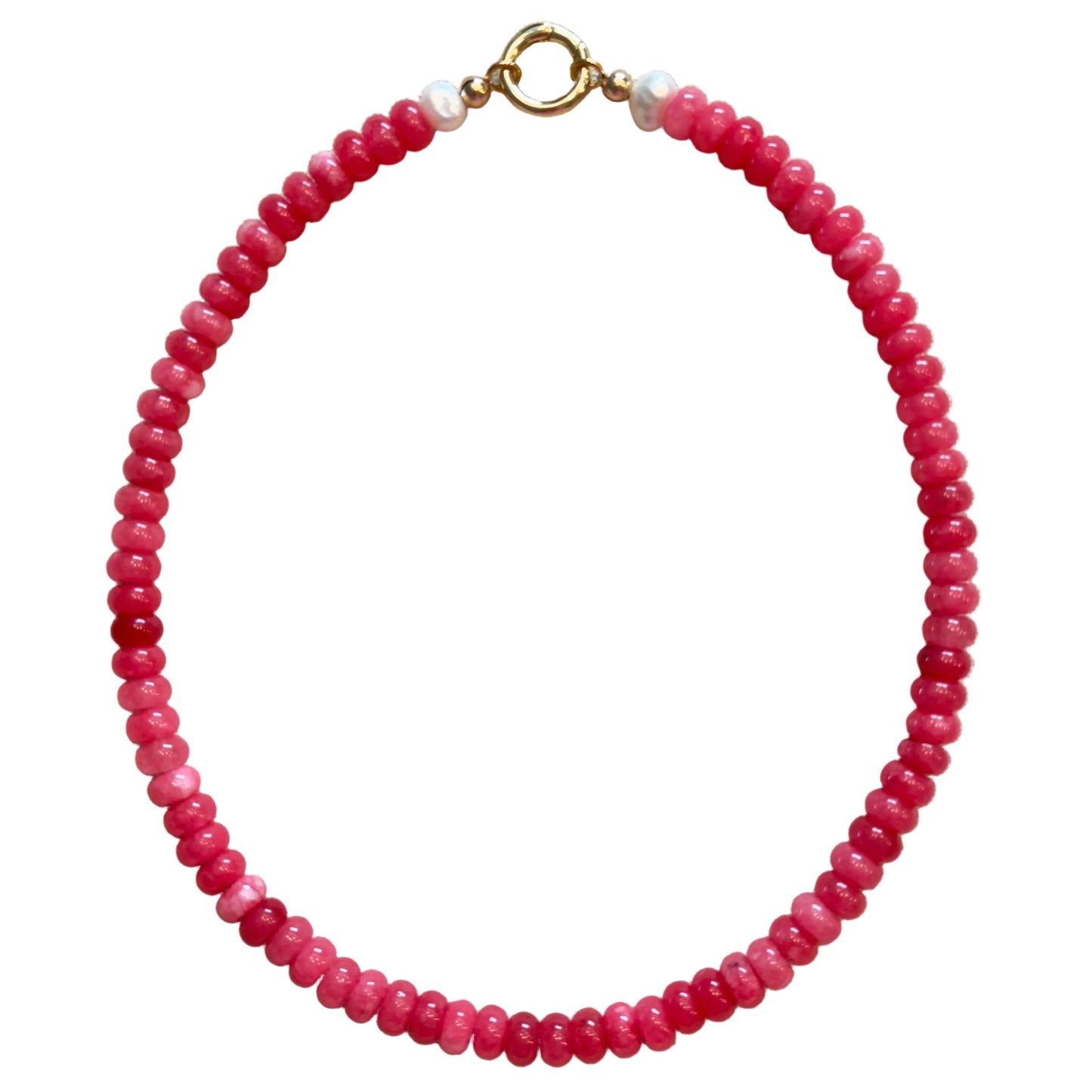pink beaded bracelet with a gold clasp on a beige fabric background